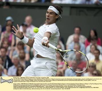 June 26, 2012 Rafael Nadal of Spain in action, defeating Thomaz Bellucci of Brazil in the first round of the Wimbledon Championships, played at All England Lawn Tennis and Croquet Club, London, England TENNIS: JUN 26 Wimbledon Championships Icon20132054 EDITORIAL USE ONLY