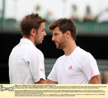 TENNIS - ATP, Wimbledon 2012 LONDON,ENGLAND,27.JUN.12 - TENNIS - ATP Tennis Herren World Tour, Wimbledon 2012, Grand Slam. Bild zeigt Stanislas Wawrinka (SUI) und Jürgen Melzer (AUT). 