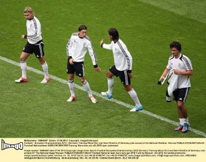 Football - European Championships 2012 - Germany Training Mesut Ozil and Sami Khedira of Germany joke around at the National Stadium, Warsaw 
