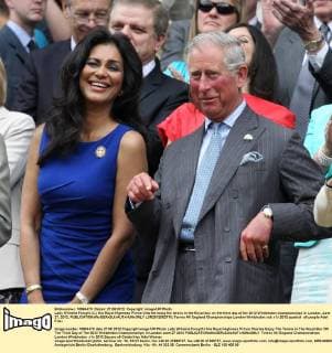 Lady Wilnelia Forsyth (L), His Royal Highness Prince Charles enjoy the tennis in the Royal box on the third day of the 2012 Wimbledon championships in London, June 27, 2012.  LON2012062718