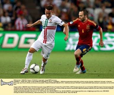 FUSSBALL - EURO 2012, POR vs ESP DONETSK,UKRAINE,27.JUN.12 - FUSSBALL - UEFA Europameisterschaft 2012 in Polen und der Ukraine, Halbfinale, Portugal vs Spanien. Bild zeigt Joao Pereira (POR) und Andres Iniesta (ESP). 