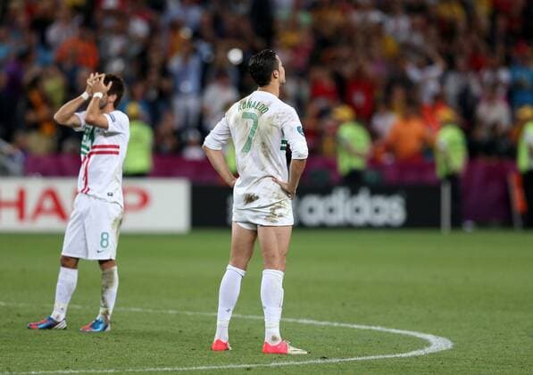 FUSSBALL - EURO 2012, POR vs ESP DONETSK,UKRAINE,27.JUN.12 - FUSSBALL - UEFA Europameisterschaft 2012 in Polen und der Ukraine, Halbfinale, Portugal vs Spanien. Bild zeigt die Enttäuschung von Cristiano Ronaldo und Joao Moutinho (POR). 