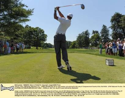 June 27, 2012 - Bethesda, Maryland, U.S. - TIGER WOODS tees off on hole number nine during Pro-Am play at Congressional Country Club. Golf 2012 - AT&T National Pro-Am - Day one - ZUMAcjm
