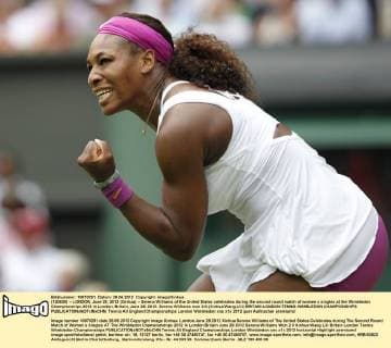 (120628) -- LONDON, June 28, 2012 (Xinhua) -- Serena Williams of the United States celebrates during the second round match of women s singles at the Wimbledon Championships 2012 in London, Britain, June 28, 2012. Serena Williams won 2-0.(Xinhua Wang Lili) BRITAIN-LONDON-TENNIS-WIMBLEDON CHAMPIONSHIPS 