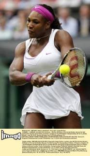 (120628) -- LONDON, June 28, 2012 (Xinhua) -- Serena Williams of the United States returns the ball during the second round match of women s singles at the Wimbledon Championships 2012 in London, Britain, June 28, 2012. Serena Williams won 2-0.(Xinhua Wang Lili) BRITAIN-LONDON-TENNIS-WIMBLEDON CHAMPIONSHIPS 