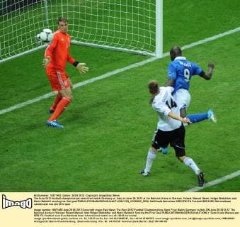 The Euro 2012 football championships semi-final match Germany vs. Italy on June 28, 2012 at the National Arena in Warsaw, Poland. Manuel Neuer, Holger Badstuber and Mario Balotelli scoring his first goal  EN_01035922_0034
