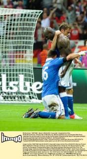 28.06.2012 Warsaw, Poland. Mario Balotelli (C), Daniele De Rossi (L) and Claudio Marchisio celebrate the second goal for Italy during the European Championship Semi Final game between Germany and Italy from the National Stadium. xAnthonyxStanleyx  ActionPlus18316