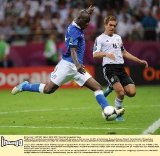 The Euro 2012 football championships semi-final match Germany vs. Italy on June 28, 2012 at the National Arena in Warsaw, Poland. Mario Balotelli, Philipp Lahm  EN_01035922_0106