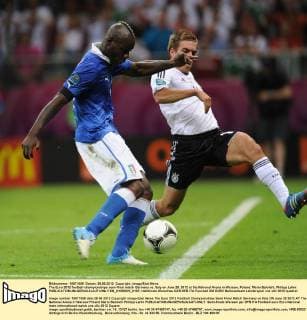 The Euro 2012 football championships semi-final match Germany vs. Italy on June 28, 2012 at the National Arena in Warsaw, Poland. Mario Balotelli, Philipp Lahm  EN_01035922_0107