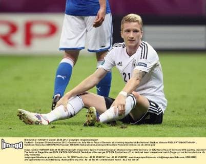 Football - European Championships 2012 - Germany vs. Italy Marco Reus of Germany sits looking dejected at the National Stadium, Warsaw 