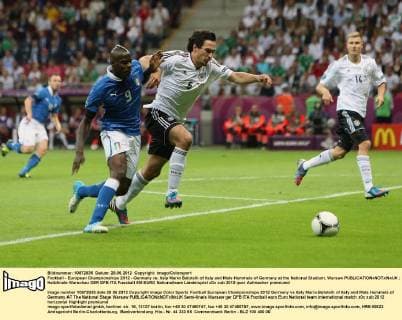 Football - European Championships 2012 - Germany vs. Italy Mario Balotelli of Italy and Mats Hummels of Germany at the National Stadium, Warsaw 