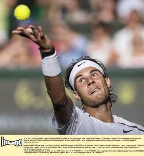 28.06.2012. The Wimbledon Tennis Championships 2012 held at The All England Lawn Tennis and Croquet Club, London, England, UK. Rafael Nadal (ESP) in action. xDuncanxGrovex  ActionPlus20132735