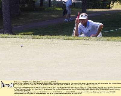 June 28, 2012 - Bethesda, MD, U.S. - DAVIS LOVE III eyes up a putt on the 15th hole during the first round of play of the AT&T National PGA Golf Herren event held at Congressional Country Club. AT&T National First Round - ZUMAb21