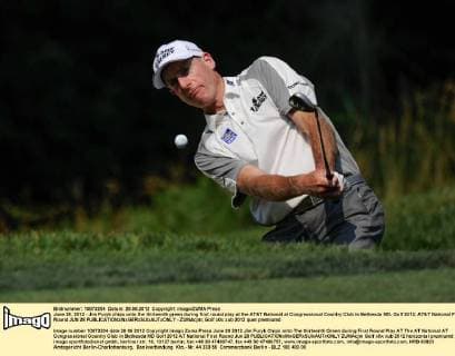 June 28, 2012 - Jim Furyk chips onto the thirteenth green during first round play at the AT&T National at Congressional Country Club in Bethesda MD. Golf 2012: AT&T National First Round JUN 28 - ZUMAcjm