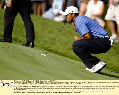 June 29, 2012 - Bethesda, MD, U.S. - TIGER WOODS eyes up a putt on the 12th hole during the 2nd round of play of the AT&T National PGA Golf Herren event held at Congressional Country Club AT&T National Second Round - ZUMAb21