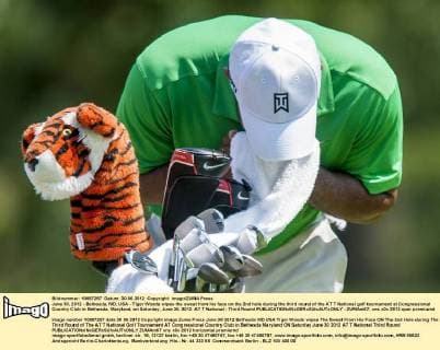 June 30, 2012 - Bethesda, MD, USA - Tiger Woods wipes the sweat from his face on the 2nd hole during the third round of the AT T National golf tournament at Congressional Country Club in Bethesda, Maryland, on Saturday, June 30, 2012. AT T National - Third Round - ZUMAm67