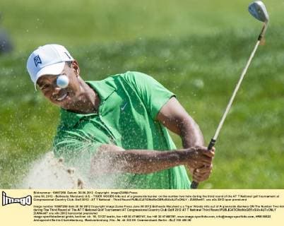 June 30, 2012 - Bethesda, Maryland, U.S. - TIGER WOODS hits out of a greenside bunker on the number two hole during the third round of the AT T National golf tournament at Congressional Country Club. Golf 2012 - AT T National - Third Round - ZUMAm67