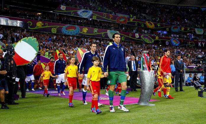 Gianluigi Buffon of Italy and Iker Casillas of Spain lead their teams onto the field..Euro 2012 Final, Spain v Italy at the Olympic Stadium, Kiev, Ukraine on the 1st July 2012. Pic Jake Badger SPORTIMAGE... EDITORIAL USE ONLY. No use with unauthorised audio, video, data, fixture lists, club league logos or live services. Online in-match use limited to 120 images, no video emulation. No use in betting, games or single club league player publications.