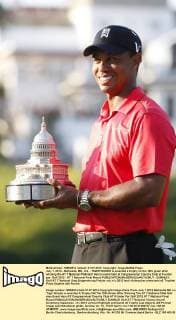 July 1, 2012 - Bethesda, MD, U.S. - TIGER WOODS is awarded a trophy on the 18th green after winning the AT T National PGA Golf Herren event held at Congressional Country Club at 8 under par. Golf 2012 - AT T National Final Round - ZUMAb21