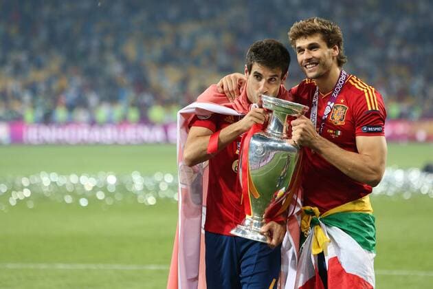European Championships 2012 Final - Javi Martinez and Fernando Llorente of Spain celebrate with the trophy at the Olympic Stadium, Kiev 