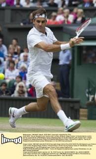 04.07.2012. The All England Lawn Tennis Club. London, England. Roger Federer of Switzerland in action during quarterfinals at Wimbledon Tennis Championships at The All England Lawn Tennis Club. London, England, UK xNigelxWaldronx  ActionPlus11299741