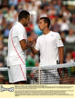 TENNIS - ATP, Wimbledon 2012 LONDON,ENGLAND,04.JUL.12 - TENNIS - ATP Tennis Herren World Tour, Wimbledon 2012, Grand Slam. Bild zeigt Jo-Wilfried Tsonga (FRA) und Philipp Kohlschreiber (GER). 