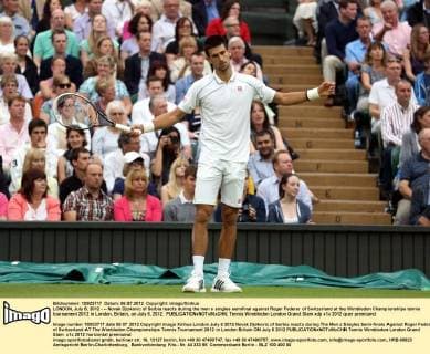 LONDON, July 6, 2012 - -- Novak Djokovic of Serbia reacts during the men s singles semifinal against Roger Federer of Switzerland at the Wimbledon Championships tennis tournament 2012 in London, Britain, on July 6, 2012. 