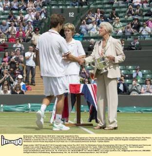 08.07.2012. The Wimbledon Tennis Championships 2012 held at The All England Lawn Tennis and Croquet Club, London, England, UK. Boy s Singles Finals. Filip Peliwo (CANADA) is presented with his trophy. xDuncanxGrovex  ActionPlus20255342