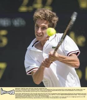 08.07.2012. The Wimbledon Tennis Championships 2012 held at The All England Lawn Tennis and Croquet Club, London, England, UK. Boy s Singles Finals. Luke Saville (AUS) v Filip Peliwo (CAN). Filip Peliwo in action. xDuncanxGrovex  ActionPlus20255335