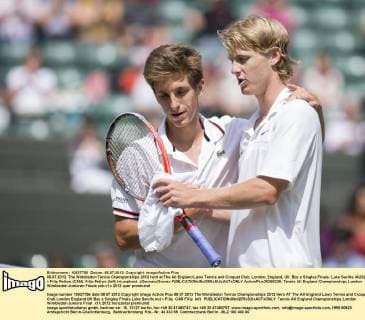 08.07.2012. The Wimbledon Tennis Championships 2012 held at The All England Lawn Tennis and Croquet Club, London, England, UK. Boy s Singles Finals. Luke Saville (AUS) v Filip Peliwo (CAN). Filip Peliwo (left) triumphant. xDuncanxGrovex  ActionPlus20255338