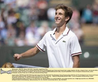 08.07.2012. The Wimbledon Tennis Championships 2012 held at The All England Lawn Tennis and Croquet Club, London, England, UK. Boy s Singles Finals. Luke Saville (AUS) v Filip Peliwo (CAN). Filip Peliwo triumphant. xDuncanxGrovex  ActionPlus20255339