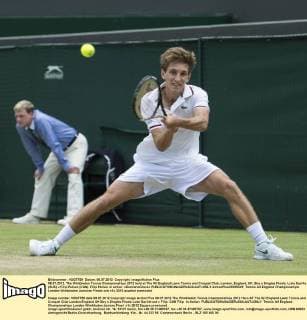 08.07.2012. The Wimbledon Tennis Championships 2012 held at The All England Lawn Tennis and Croquet Club, London, England, UK. Boy s Singles Finals. Luke Saville (AUS) v Filip Peliwo (CAN). Filip Peliwo in action. xDuncanxGrovex  ActionPlus20255341