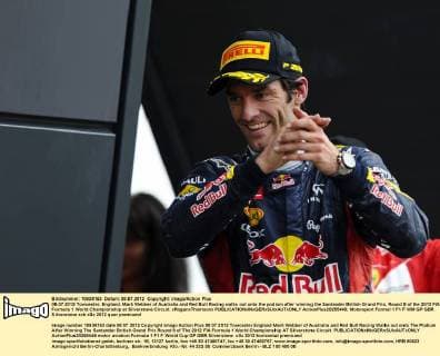 08.07.2012 Towcester, England. Mark Webber of Australia and Red Bull Racing walks out onto the podium after winning the Santander British Grand Prix, Round 9 of the 2012 FIA Formula 1 World Championship at Silverstone Circuit. xRoganxThomsonx  ActionPlus20255448