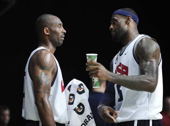 U.S. men s Olympic basketball team member LeBron James (R) talks with Kobe Bryant duing a training session of the team for the 2012 London Olympics, in Washington on July 14, 2012. (Xinhua Zhang Jun) (bxf) U.S.-WASHINGTON-BASKETBALL-OLYMPICS-TRAINING 