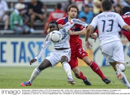 14 July 2012: Vancouver Whitecaps FC forward Darren Mattocks (22) battles with Chicago Fire defender Arne Friedrich (23) in game action. The Chicago Fire defeated the Whitecaps by the score of 1-0 at Toyota Park in Bridgeview, IL. SOCCER: JUL 14 MLS Fussball Herren USA - Whitecaps FC at Fire Icon1640714120688 EDITORIAL USE ONLY