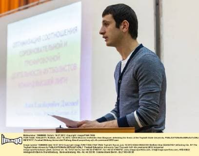 ITAR-TASS: TOGLIATTI, RUSSIA. JULY 16, 2012. CSKA Moscow midfielder Alan Dzagoyev defending his thesis at the Togliatti State University.  RE101C17