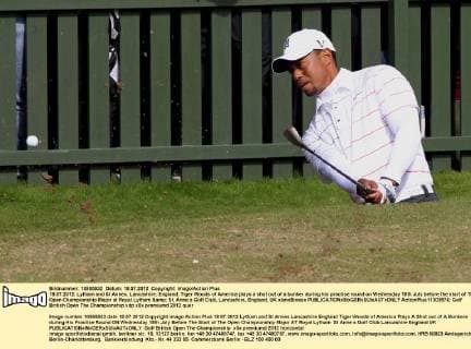 18.07.2012. Lytham and St Annes, Lancashire, England. Tiger Woods of America plays a shot out of a bunker during his practise round on Wednesday 18th July before the start of The Open Championship Major at Royal Lytham &amp; St. Anne s Golf Club, Lancashire, England, UK xIanxBinesx  ActionPlus11303576