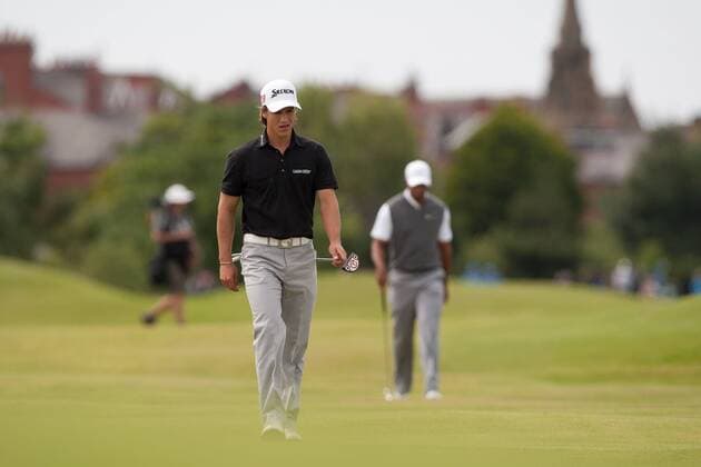 Golf - The Open - Day Three Thorbjorn Olesen of Denmark walks up the 2nd fairway ahead of a downbeat looking Tiger Woods of USA at Royal Lytham & St Anne s Golf Club 
