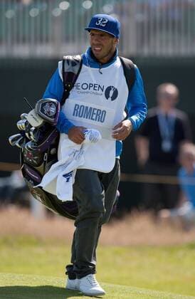 Golf - The Open - Day Four Carlos Tevez of Manchester City acts as caddie for Andres Romero of Argentina at Royal Lytham & St Anne s Golf Club 