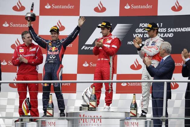L-R: Sebastian Vettel (Red Bull Racing), Sieger Fernando Alonso (Scuderia Ferrari), Jenson Button (McLaren Mercedes) GP Deutschland 2012