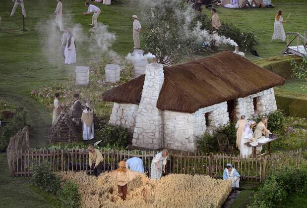 Actors depict a traditional English farm scene during the Opening Ceremonies of the London 2012 Summer Olympics on July 27, 2012 in Stafford, London. The show, created by Academy Award winning director Danny Boyle, celebrates England s history through the use of pop-culture and history.  OLY20120727105