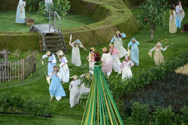 Actors dance during the Opening Ceremony of the London 2012 Summer Olympics on July 27, 2012 in Stafford, London. The show, created by Academy Award winning director Danny Boyle, celebrates England s history through the use of pop-culture and history.  OLY20120727107
