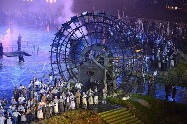 Actors perform during the Age of Industry scene during the Opening Ceremony of the London 2012 Summer Olympics on July 27, 2012 in Stafford, London. The show, created by Academy Award winning director Danny Boyle, celebrates England s history through the use of pop-culture and history.  OLY20120727115