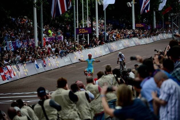LONDON, July 28, 2012 - Alexandr Vinokurov (front) of Kazakhstan celebrates after competing in the men s road race event of cycling at the London 2012 Olympic Games in London, Britain, July 28, 2012. Alexandr Vinokurov claimed the title in this event with 5:45:57. 