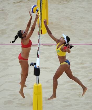 Olympics - London 2012 - Beach Volleyball - BRA v MRI Juliana Silva (BRA) and Natacha Rigobert (MRI) in action at Horse Guards Parade, London 