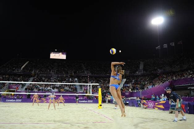 Olympics - London 2012 - Beach Volleyball - SUI v GRE Vasiliki Arvaniti (GRE) serves at Horse Guards Parade, London 