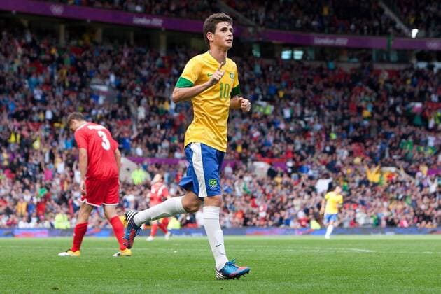 Football - London 2012 Olympics - Brazil vs. Belarus Brazil s Oscar celebrates scoring at Old Trafford, Manchester 