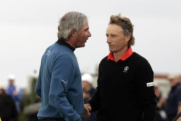29.07.2012 Ayrshire, Scotland. Fred COUPLES is congratulated by Bernhard LANGER on winning the The Rolex Senior Open Championship from Turnberry. xIanxBuchanx  ActionPlus11308272