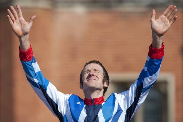 01.08.2012. Richmond, England. Gold Medallist Britains bradley Wiggins (GBR) celebrates on the podium in front of the Palace after the Mens Cycling Time Trial on Day 5 of the London 2012 Olympic Games at Hampton Court Palace. xRoganxThomsonx  ActionPlus11310173