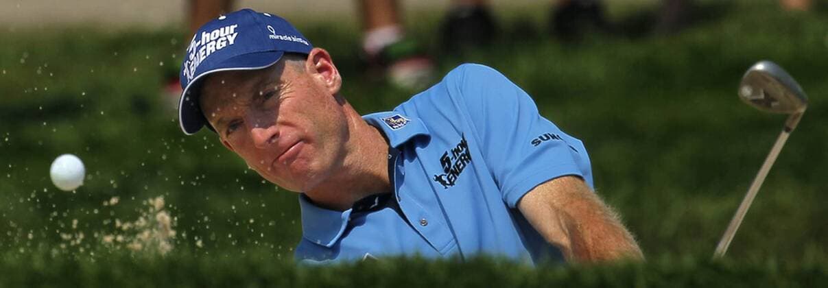 Aug. 3, 2012 - Akron, OH, USA - Jim Furyk blasts out of a bunker on the 10th hole during second-round play at the 2012 WGC-Bridgestone Invitational at Firestone Country Club on Friday, August 3, 2012, in Akron, Ohio. 2012 WGC-Bridgestone Invitational - ZUMAm67